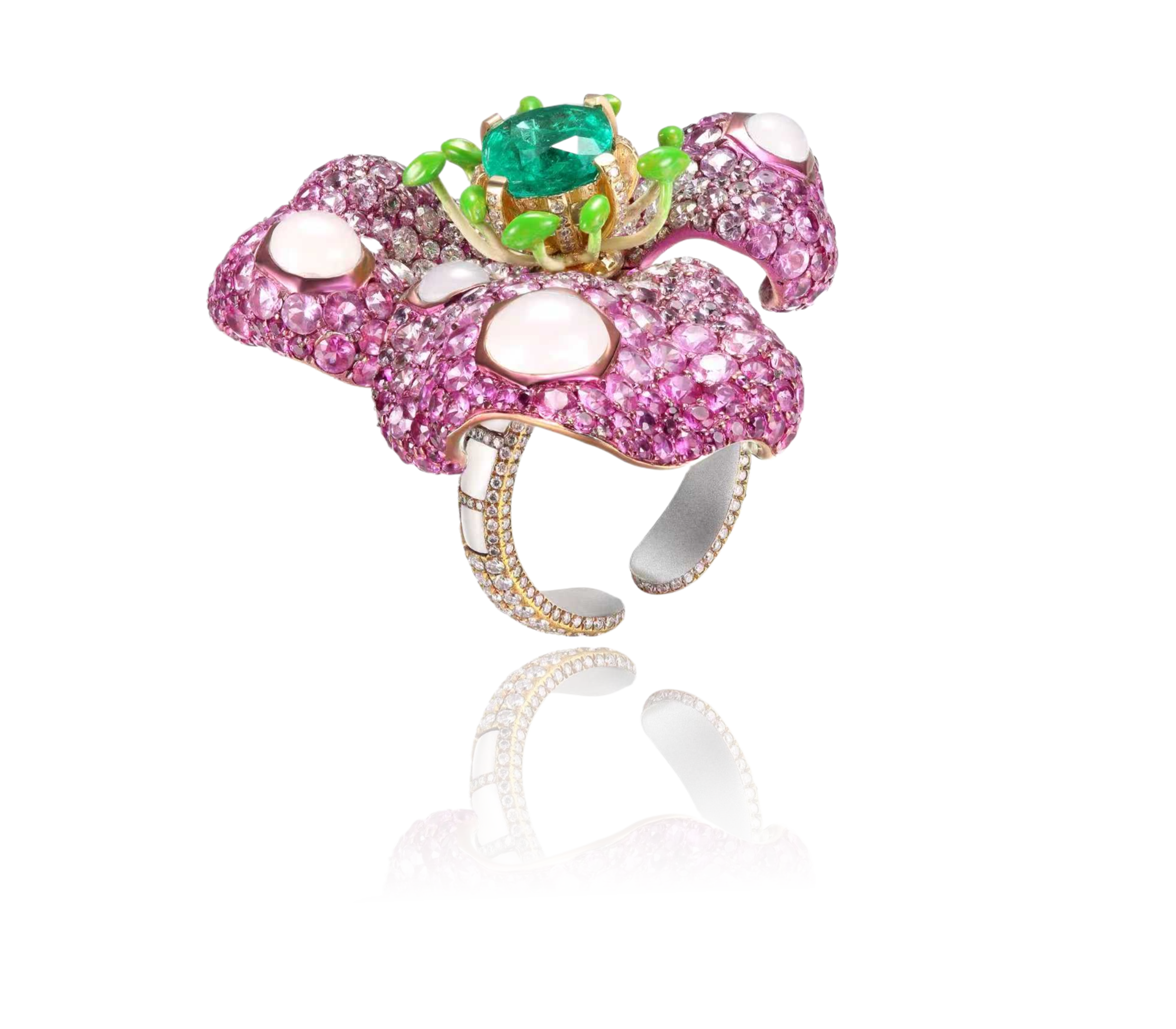 A tic-tac-toe shaped jewelry ring encrusted with pink and white gemstones, featuring a green gemstone and smaller green accents on top.