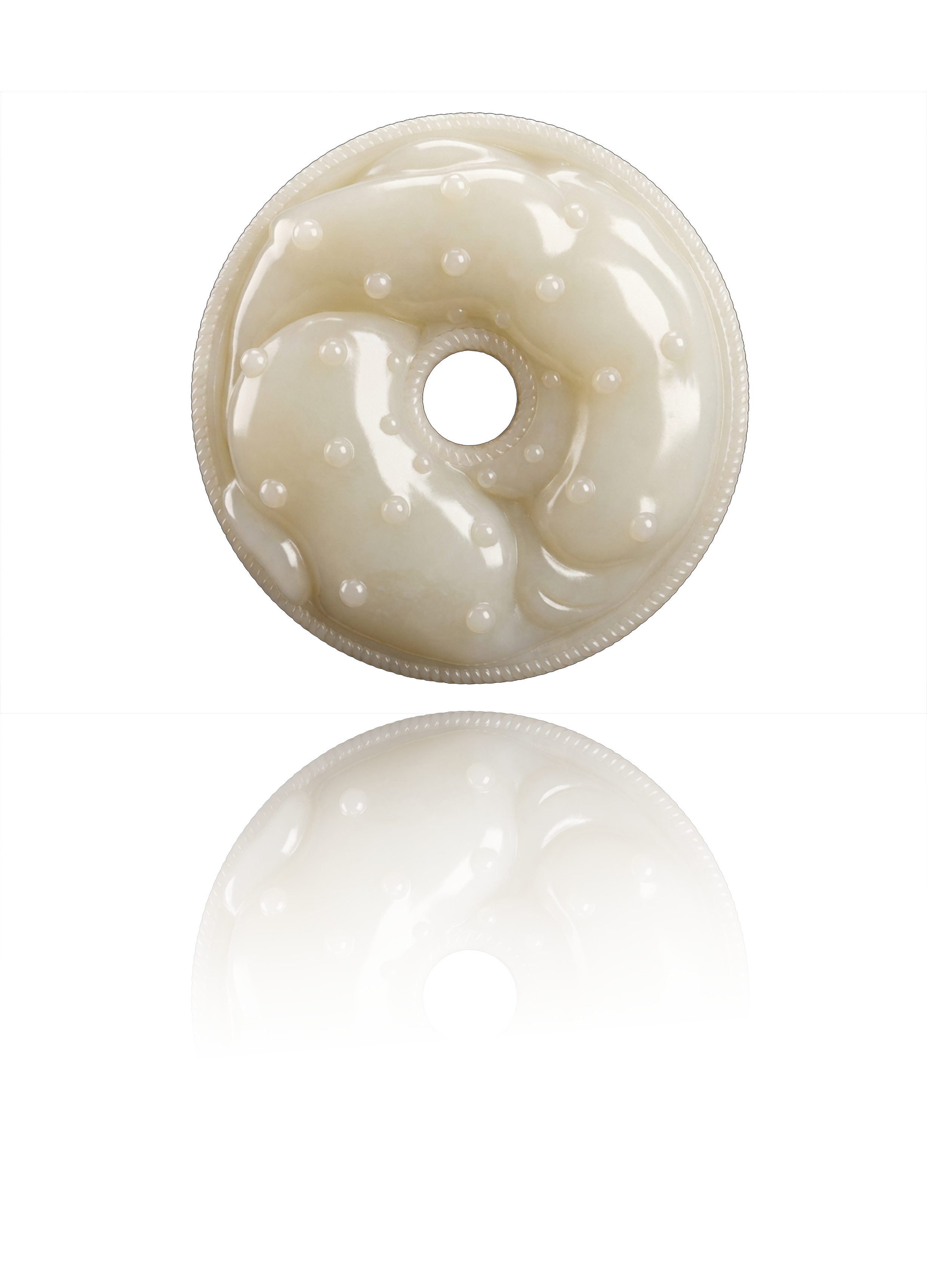 A disc of Hetian white jade, carved to depict a woman curled up in a fetal position, its surface adorned with a nipple pattern for decoration.