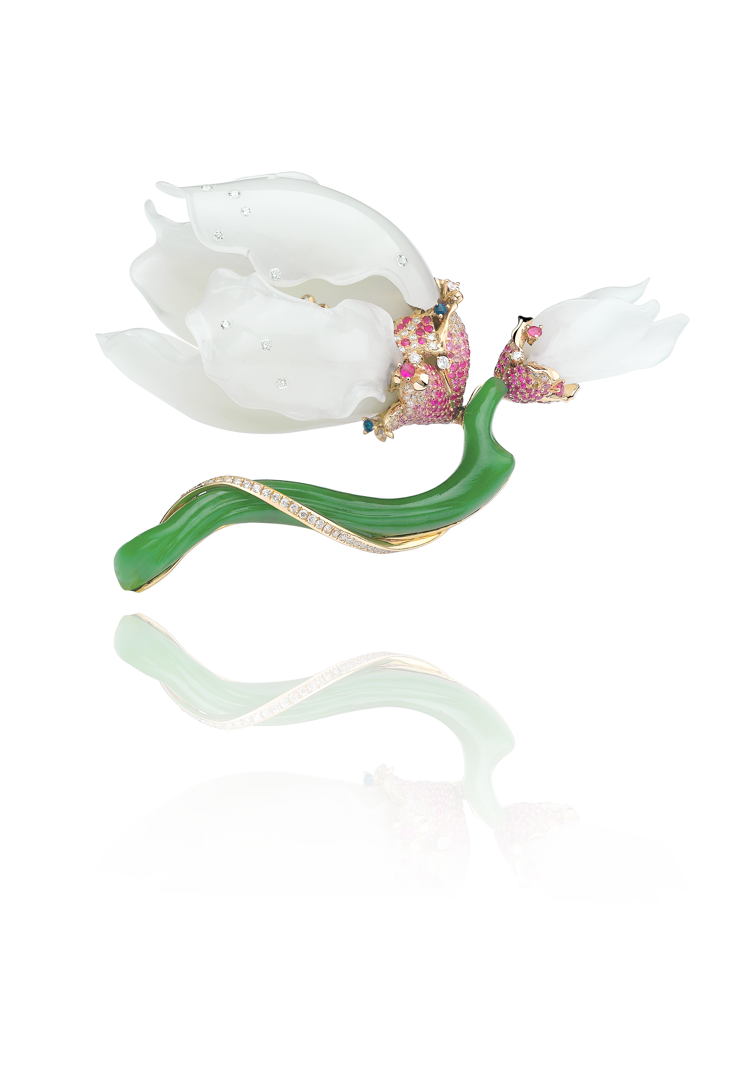 A decorative flower-shaped jewelry piece with white and pink petals, green leaves, and embedded diamonds and gemstones.