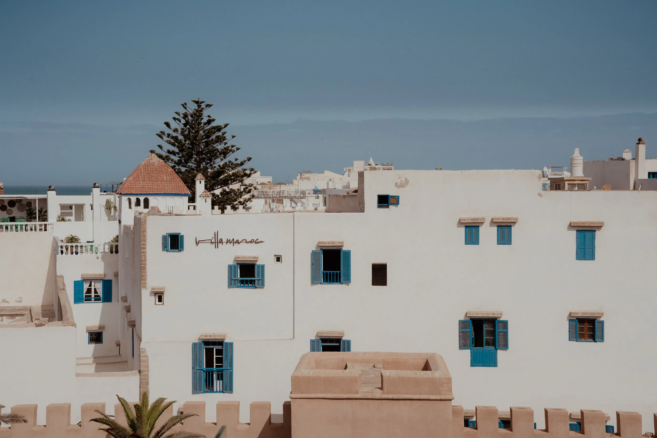The white walled building of Villa Maroc, a hotel in the heart of Essaouira's Medina