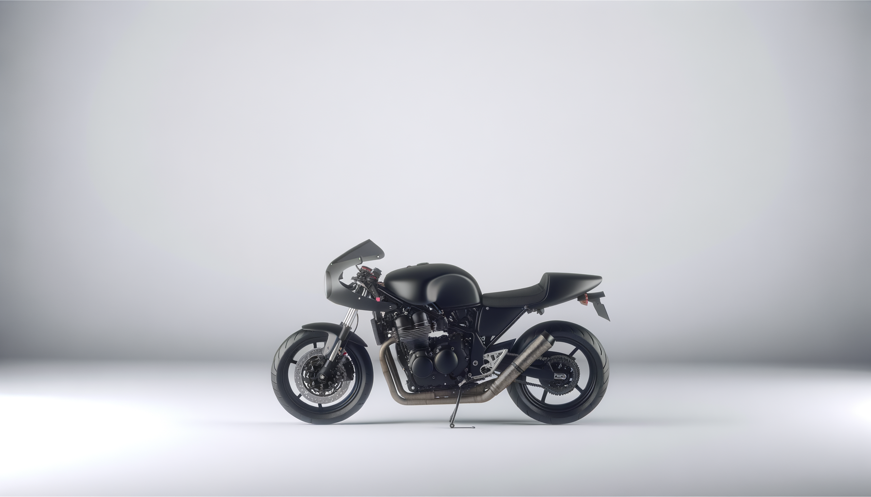 A sleek black motorcycle with a matte finish, front fairing, and sporty design, positioned on a plain white background.