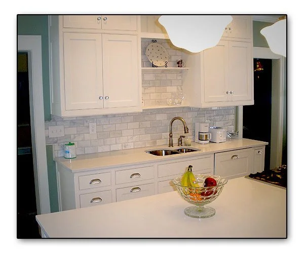 Kitchen Bar with subway tile and high end finishes