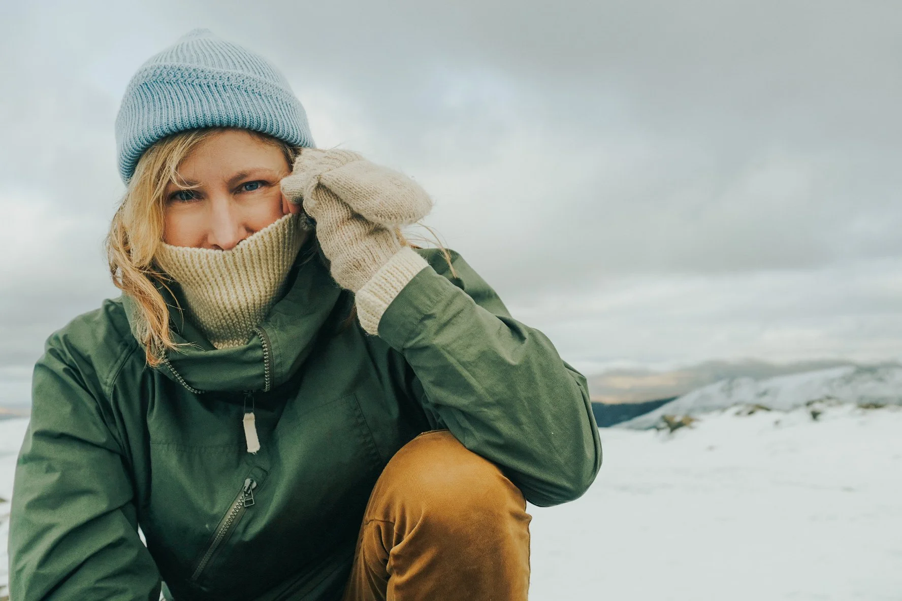 A snowy outdoor clorhing image by Lake District Mountain brand photographer Sarah.