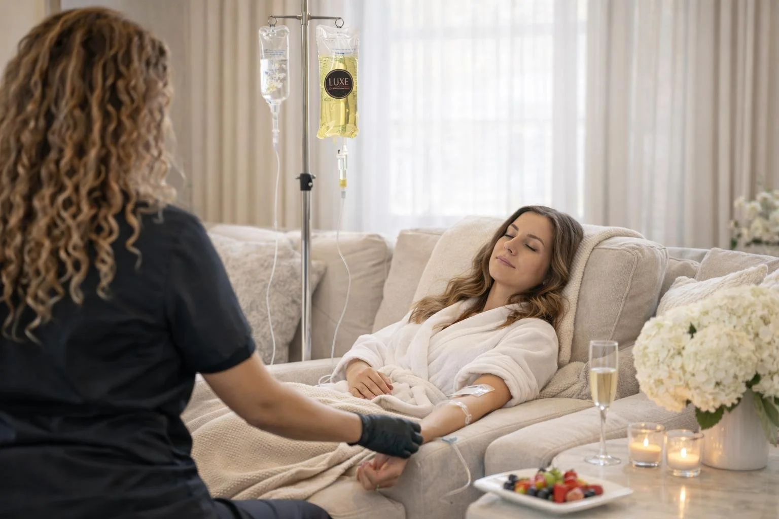 Woman relaxing on a treatment bed while receiving personalized wellness care.