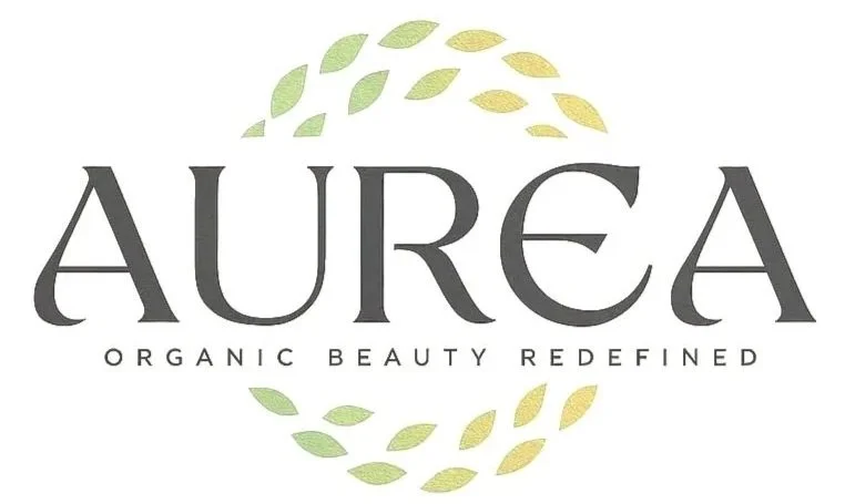 Aurea logo with the words 'Organic Beauty Redefined' and a decorative leaf design encircling the text.