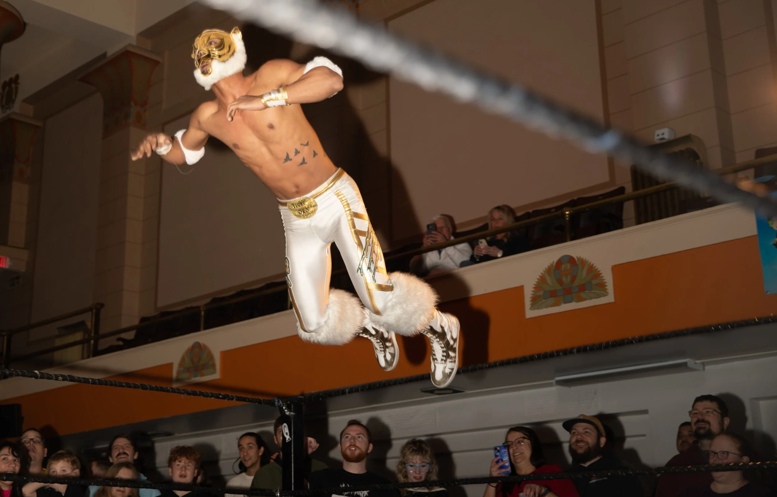 El Tigre takes flight jumping from the ropes during his match on Feb. 27, 2026, at the Helena Temple during the Queen City Slammer.