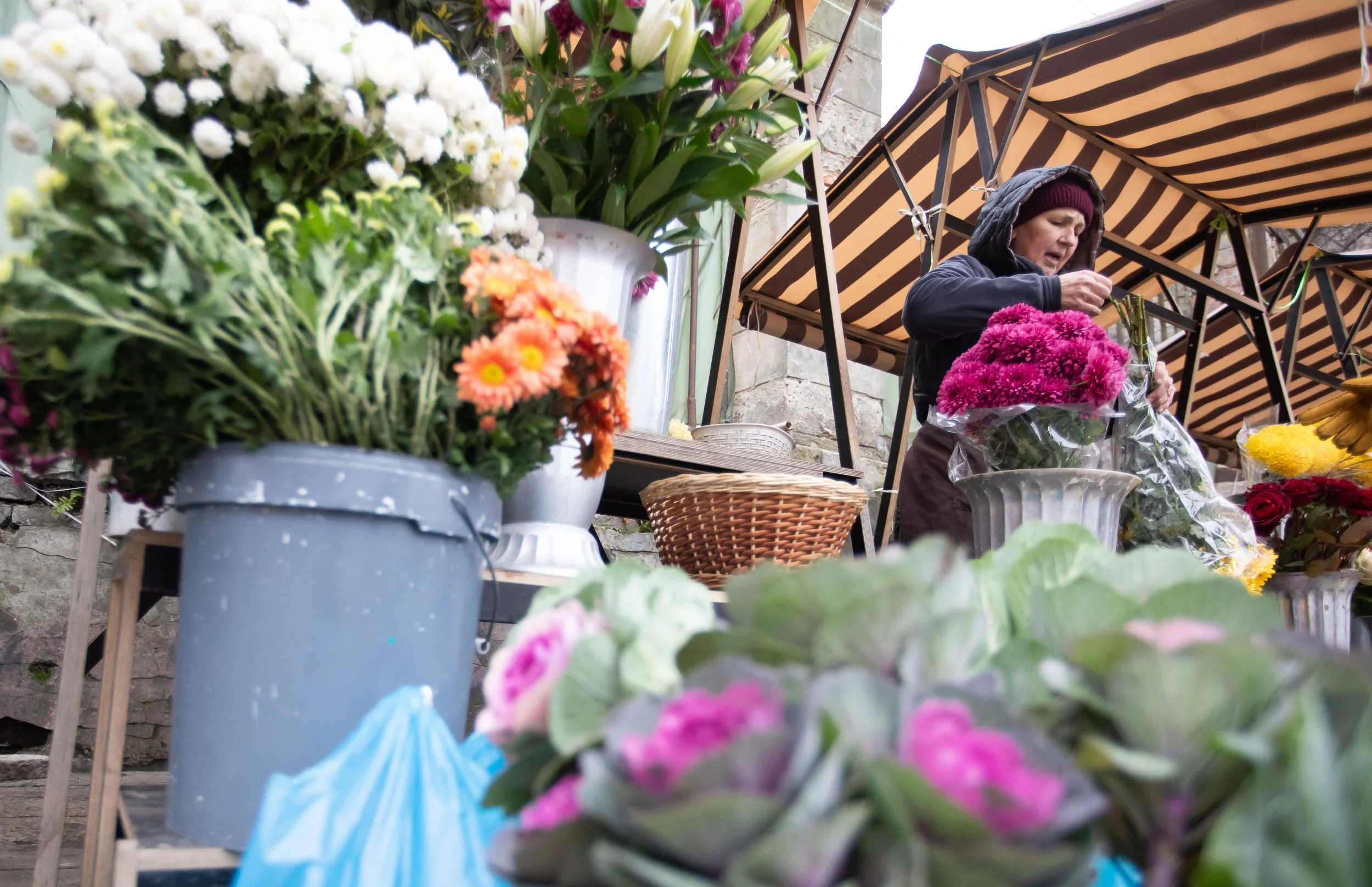 A florist speaks with a customer Nov. 20, 2025 in Lviv, Ukraine.