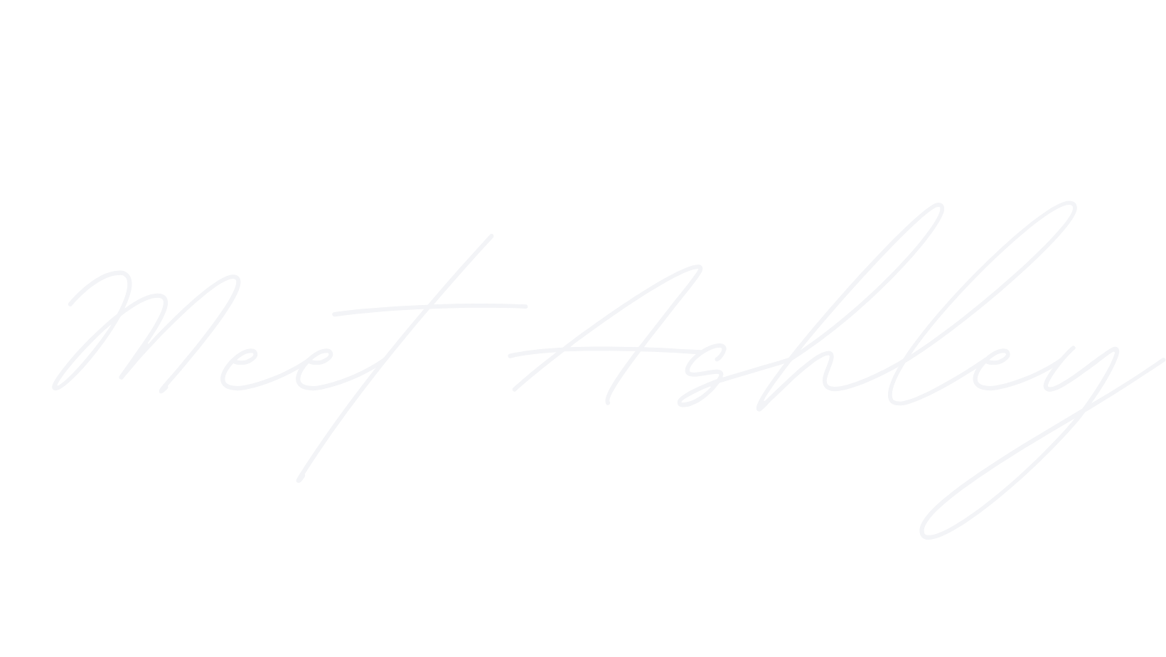 Neon sign reading 'Meet Ashley' in a cursive font against a black background.