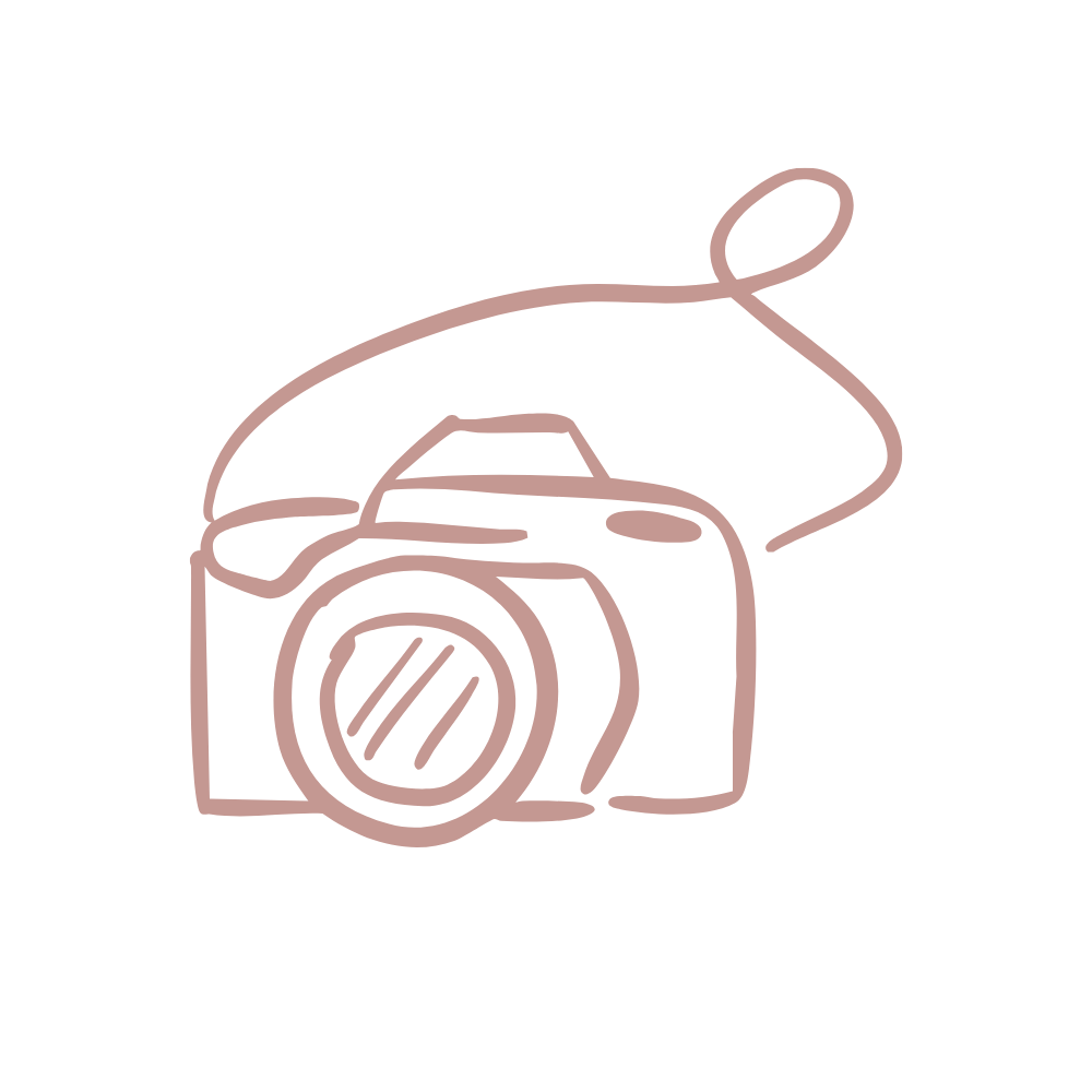 Minimalist line drawing of a camera with a circular lens and a strap