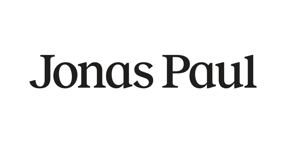 Black and white logo with the text "Jonas Paul" in the center.
