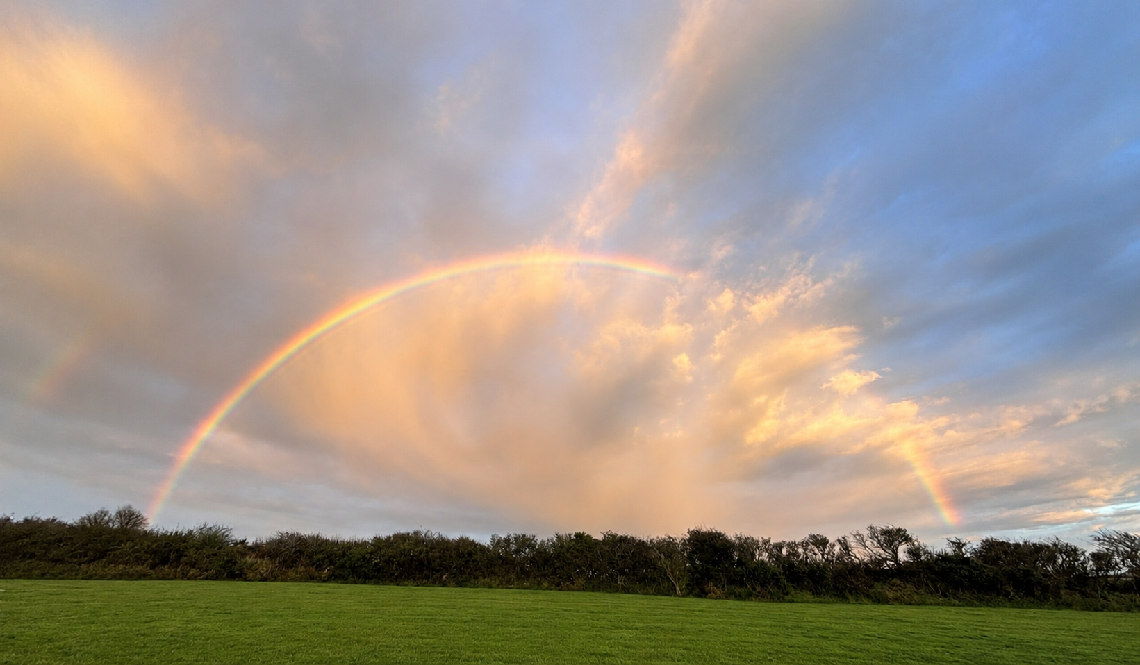 Rainbow over the countryside at Cwtch Nook, Anglesey