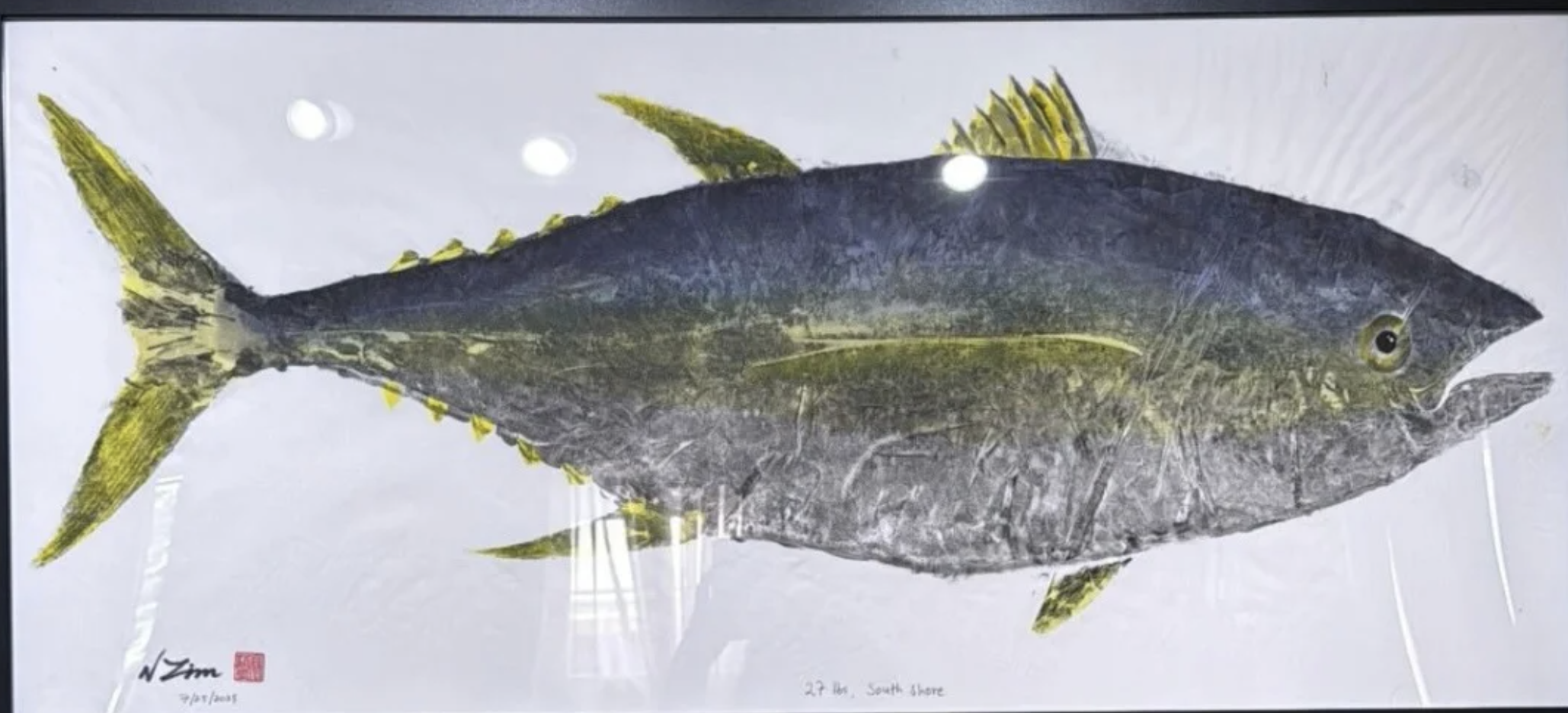 Framed illustration of a fish with a dark body and yellow fins against a white background.