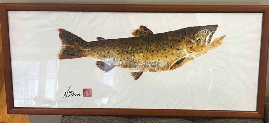 Framed painting of a trout fish with detailed scales and fins.