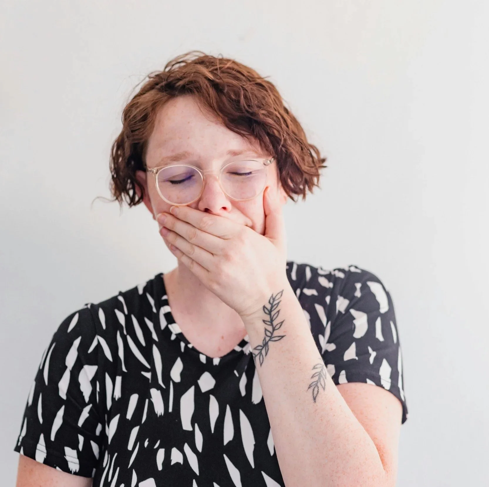 Photo of a woman yawning