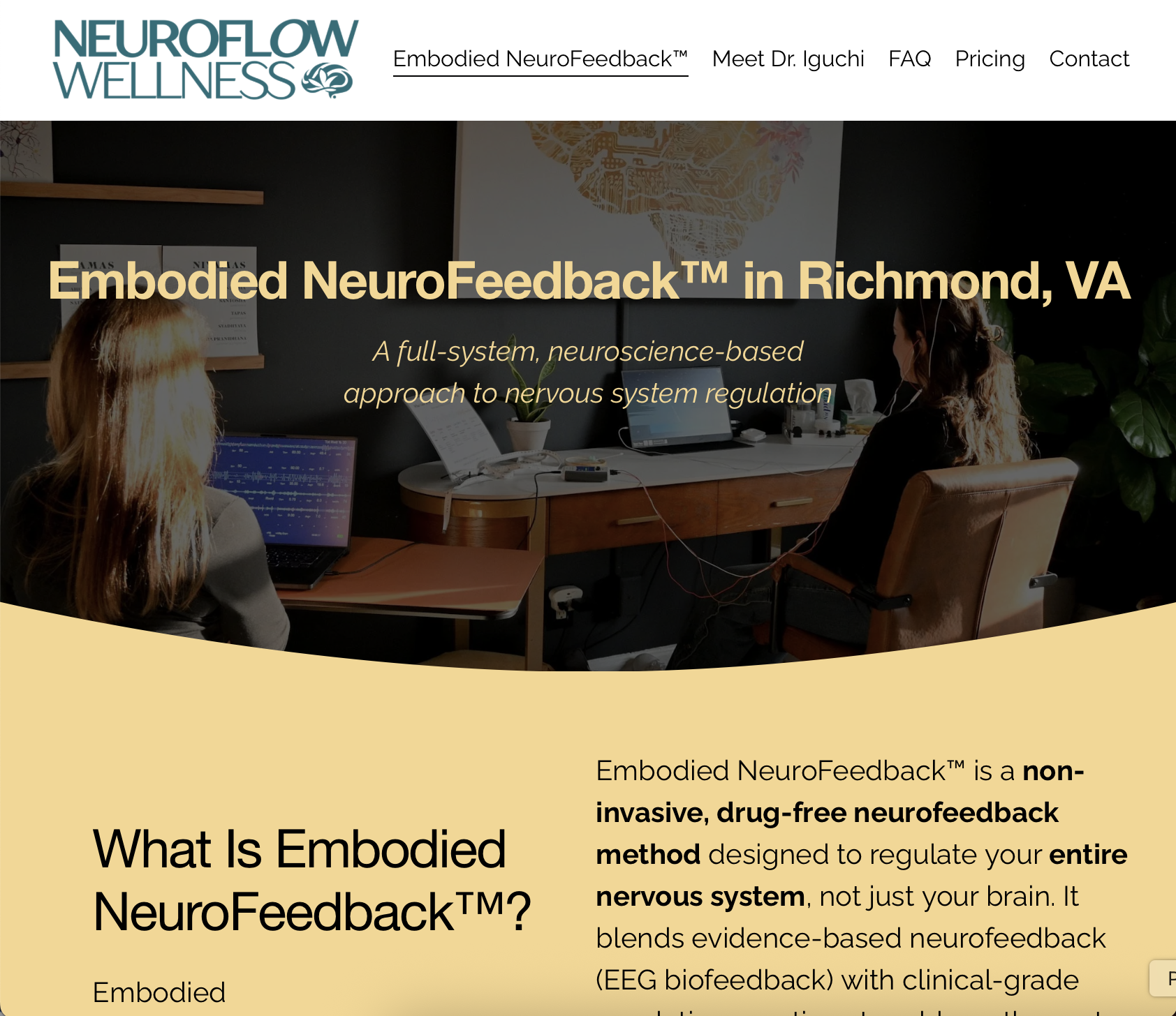 Residents of a wellness clinic using neurofeedback equipment in a room with plants, a wall decoration, and computers.