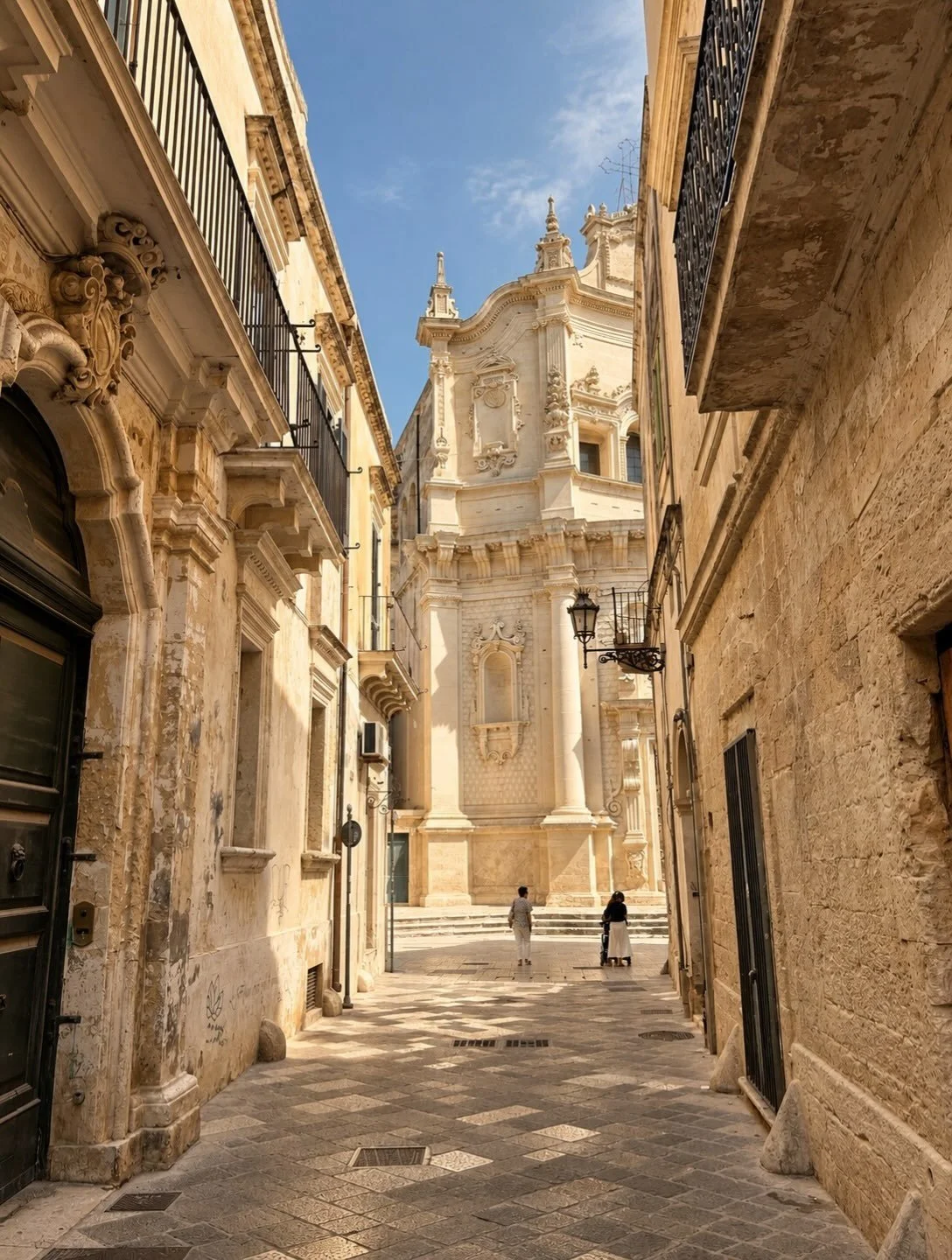 A narrow street in Salento rarely stays narrow for long &mdash; walk far enough and it opens onto a fa&ccedil;ade carved with more patience than most buildings ever ask for. Churches, palazzi and small piazzas appear almost without warning, turning a
