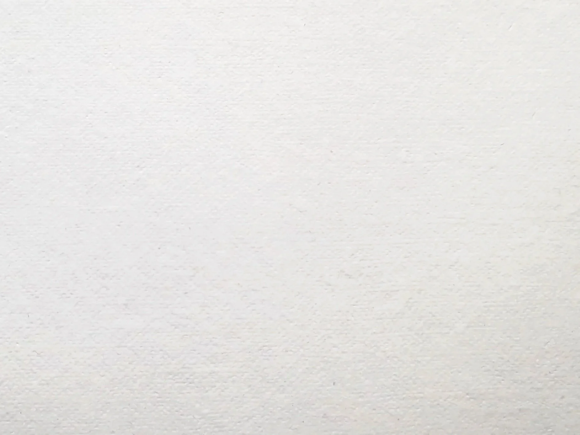 Surface blanche avec une texture légèrement granuleuse.