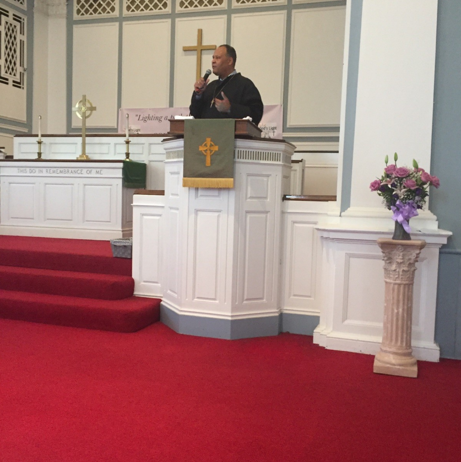 Dr. Reeves preaching in church