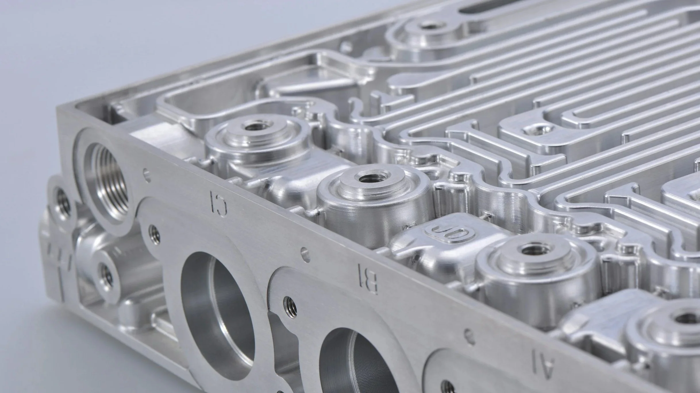 Precision CNC machined aluminum component with bored and faced features