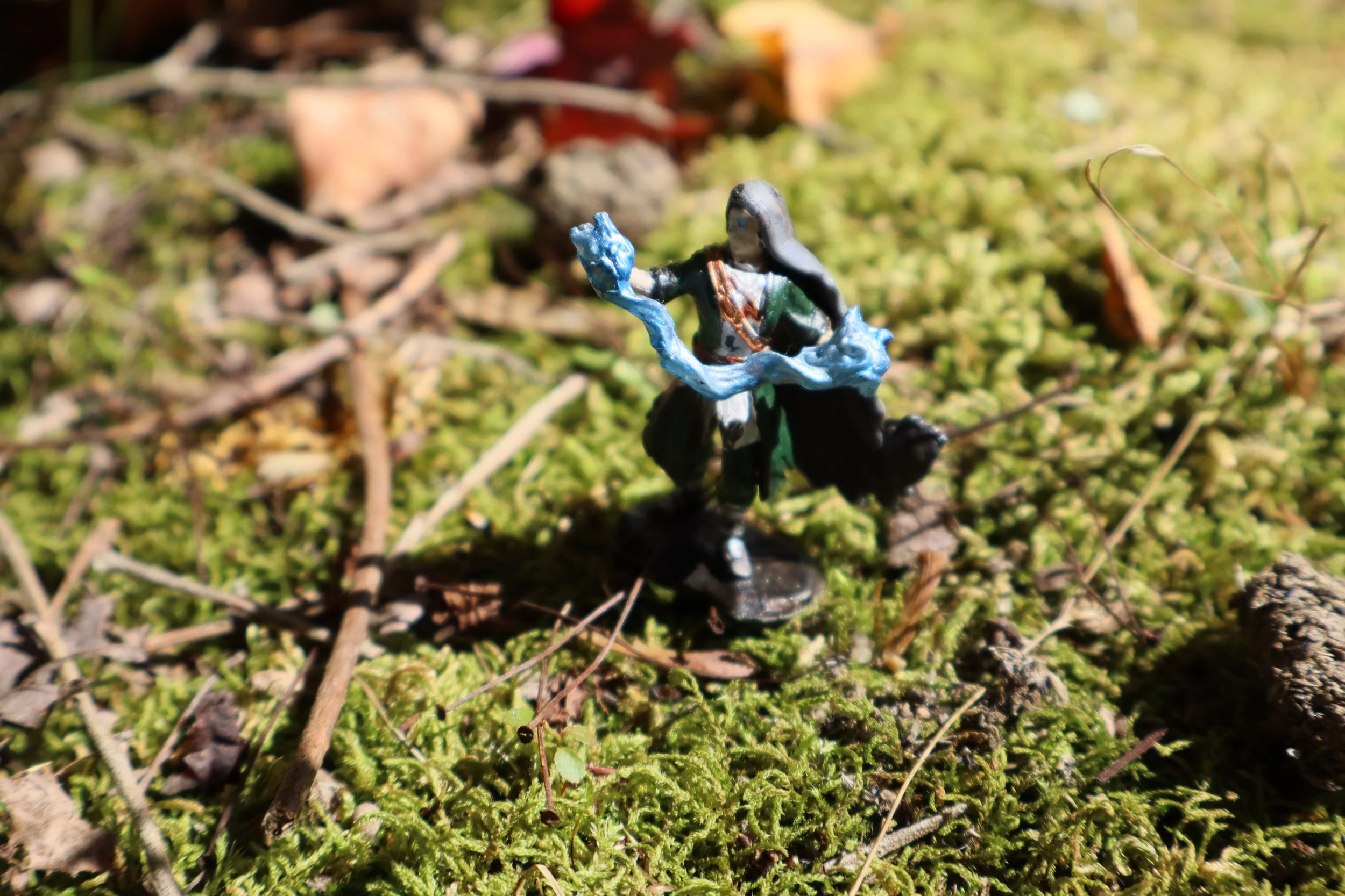 A wizard, casting his icy magic