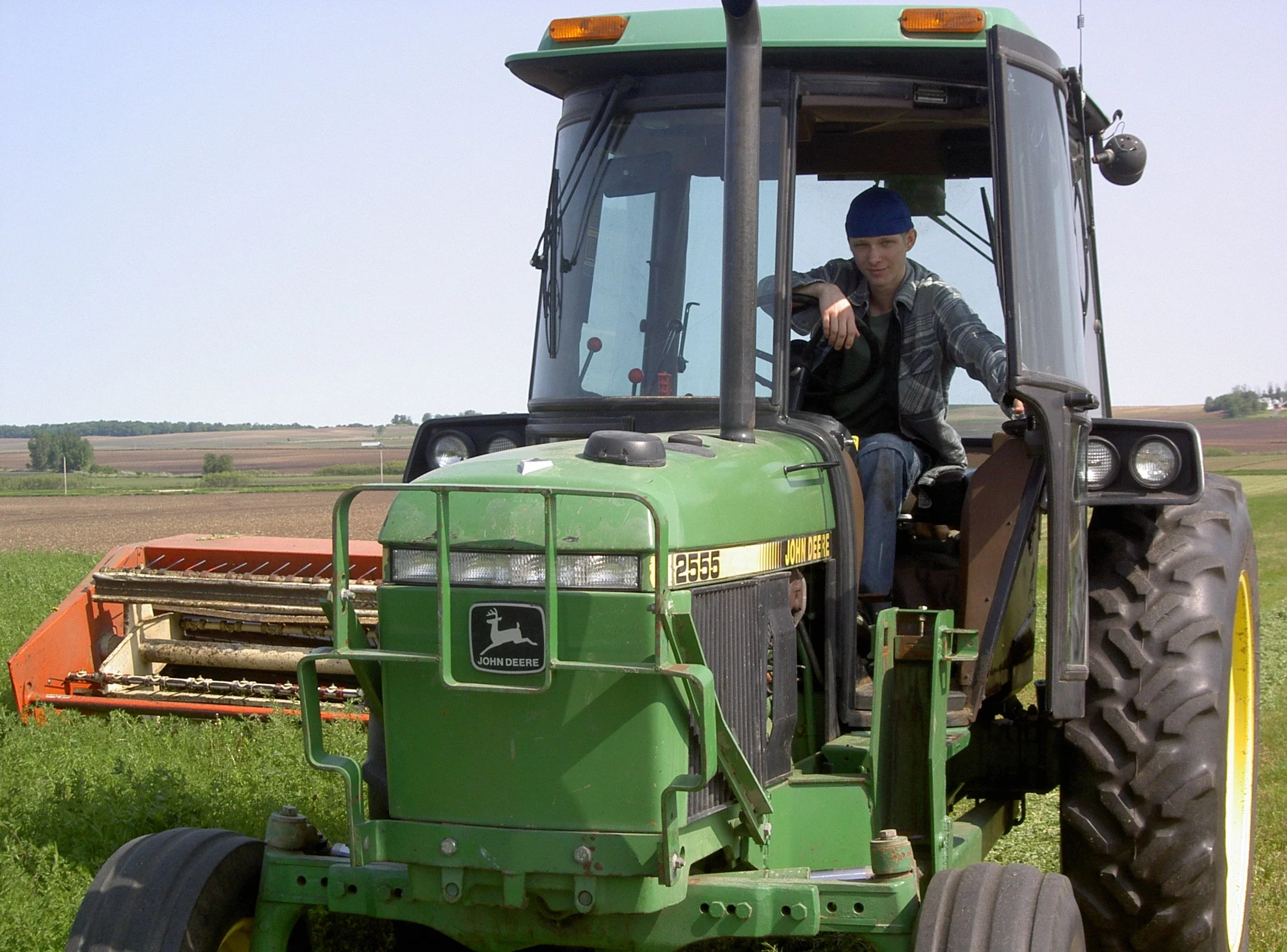 Matthew cutting alfalfa