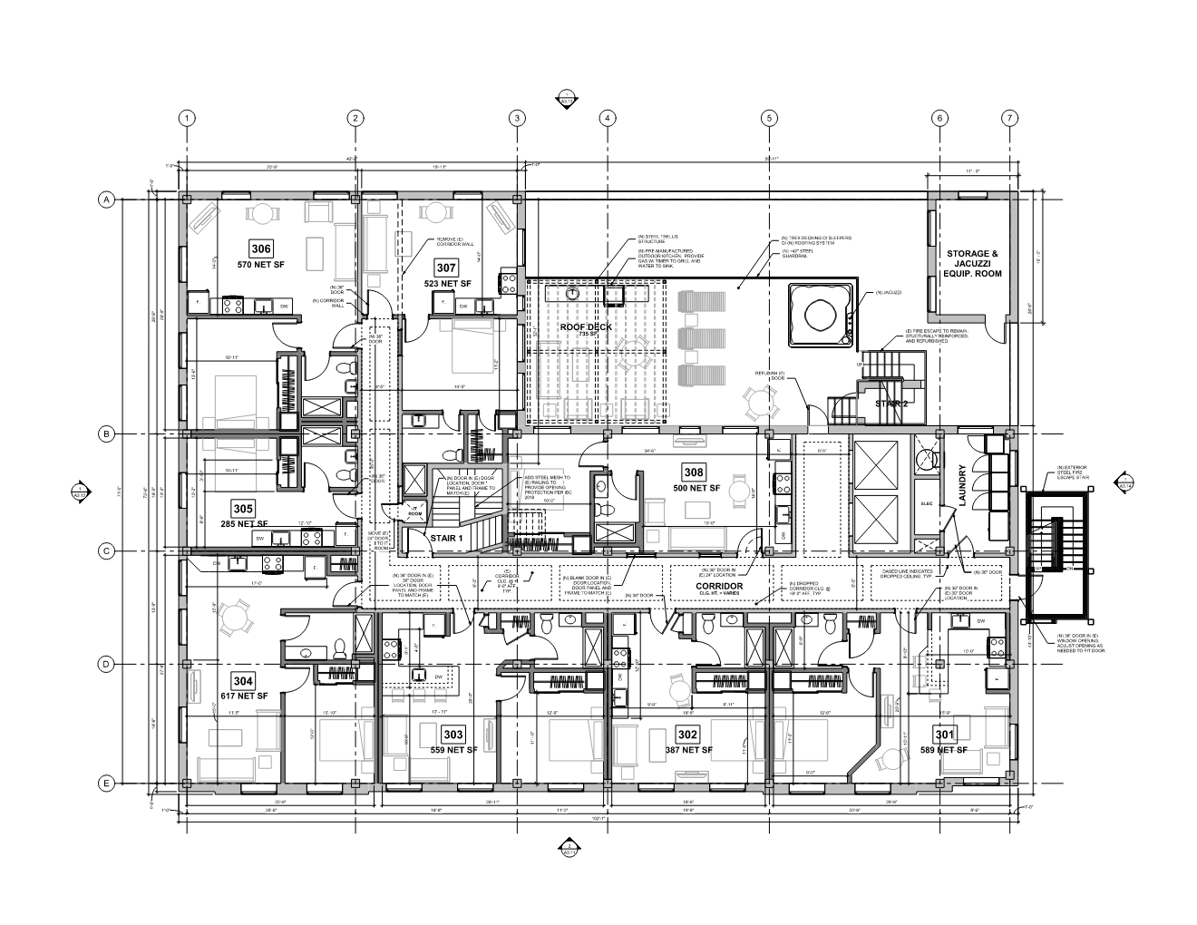 Architectural floor plan of a residential building showing multiple rooms, including bedrooms, bathrooms, kitchens, a rooftop deck, laundry area, storage room, and staircase.