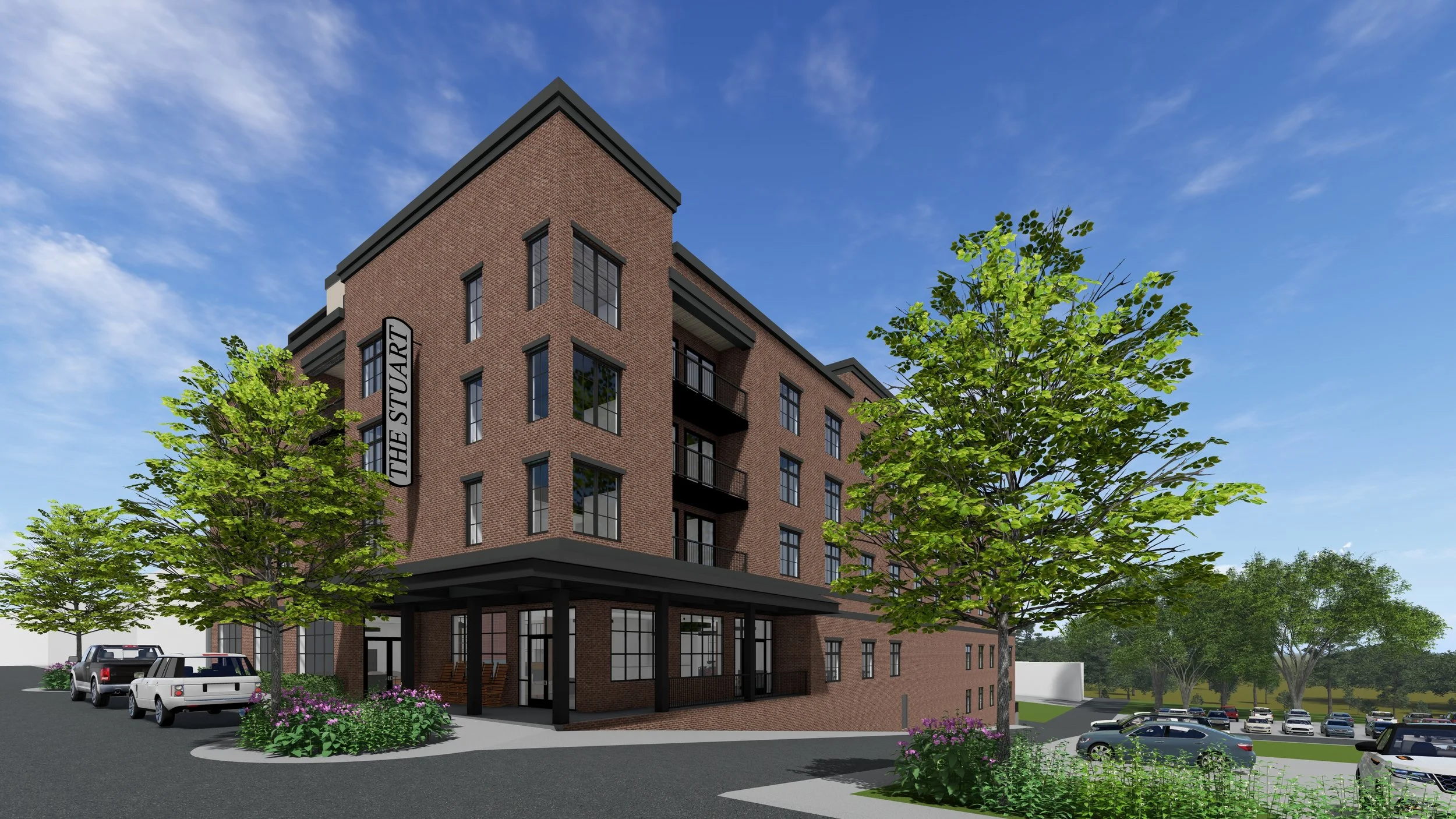 Render of a modern brick apartment building called The Stuart with landscaped parking lot and green trees under a blue sky.