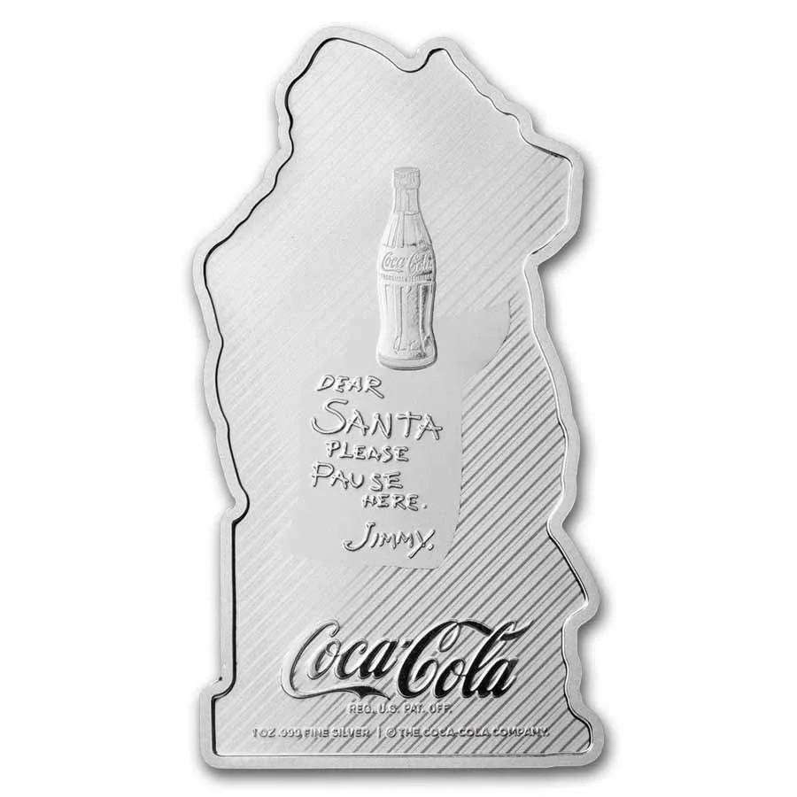 Silver Coca-Cola shape with an engraved Coke bottle and a handwritten message: 'Dear Santa please pause here. Jimmy.'