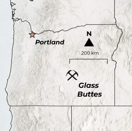 Map of Oregon showing Portland and Glass Buttes with directional arrow and two crossed pickaxes.