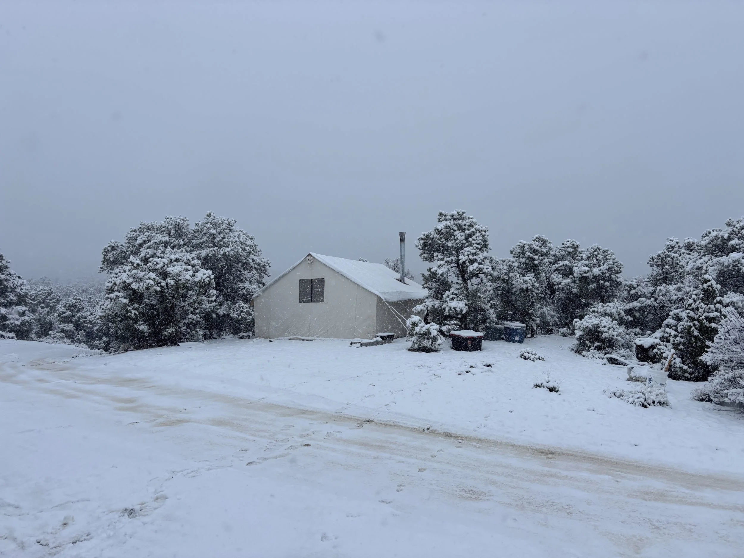 Spring snowstorm at camp in the Kawich Range.