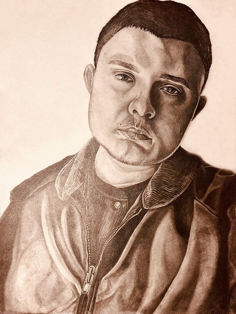 A detailed pencil sketch of a young man with short dark hair, wearing a leather jacket over a collared shirt, looking directly at the viewer with a serious expression.