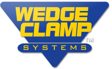 Wedge Clamp Systems logo with yellow and blue text on a dark blue background