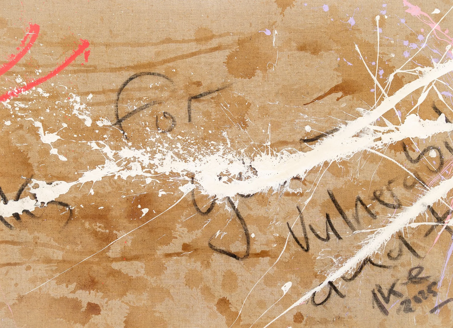A piece of paper with handwritten text that is partially obscured. The paper has ink splatters and stains on it, with some parts torn or peeled back.
