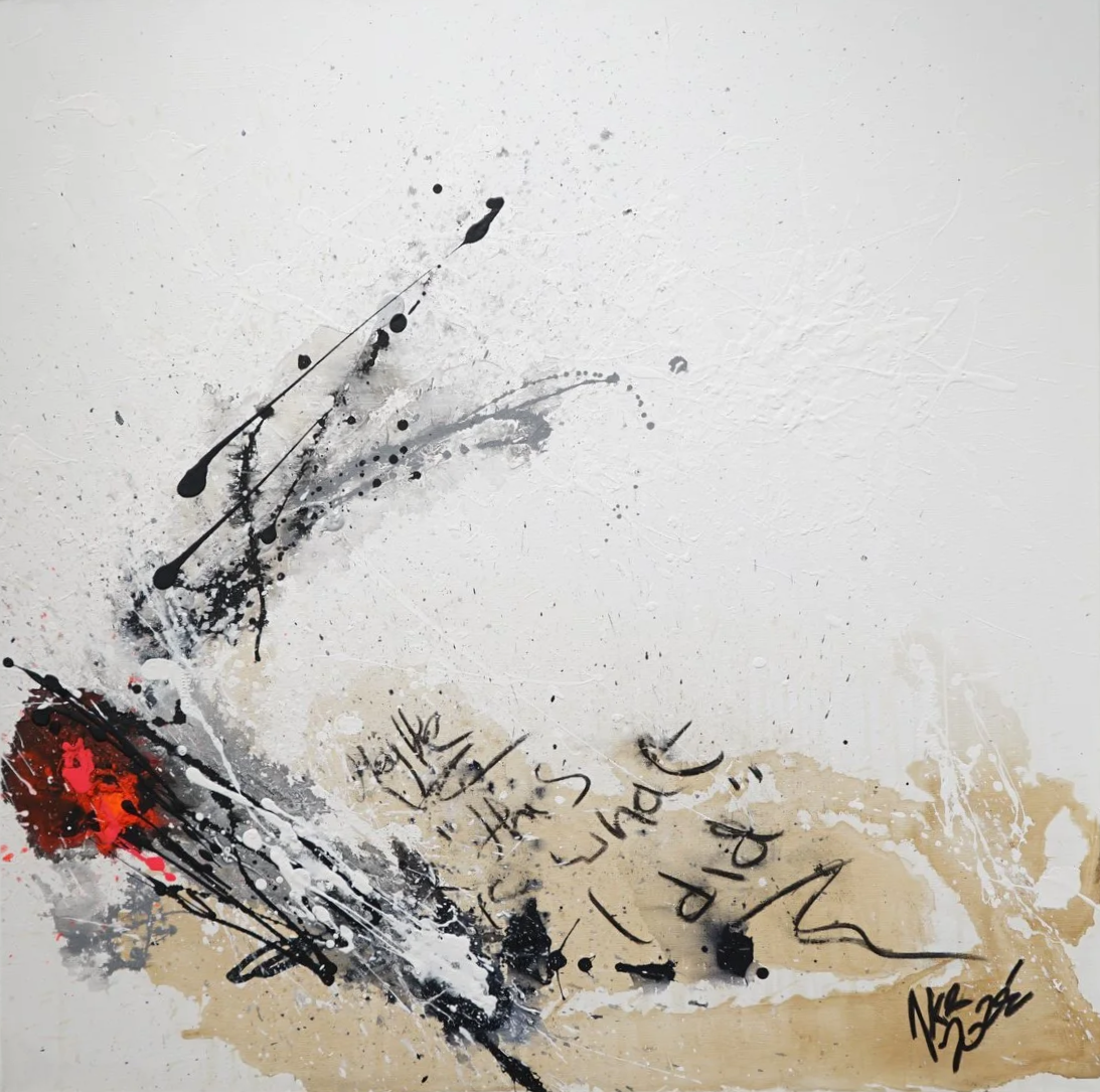 Abstract art with black, gray, and red paint splatters and strokes on a textured white background, including handwritten text.