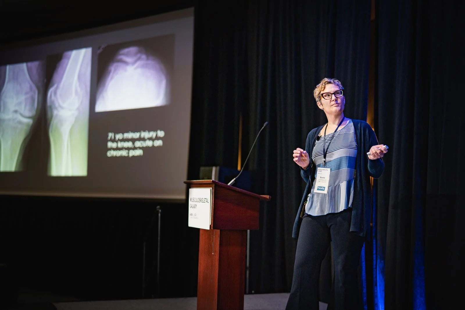 Event photography of a woman giving a presentation at the APHL annual conference