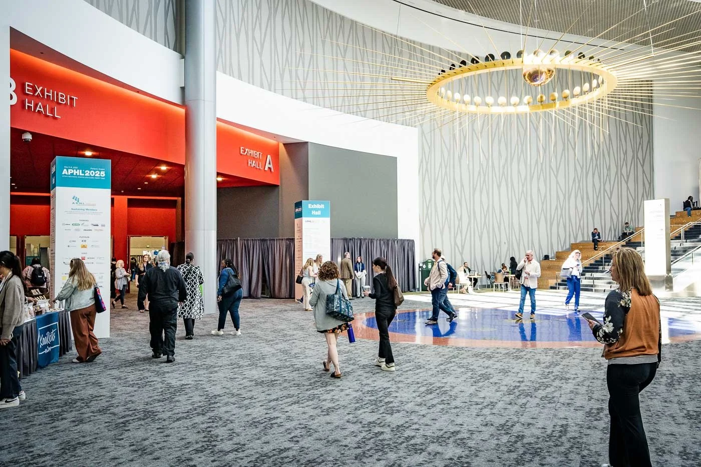Large open room with a chandelier at the Portland Expo Center