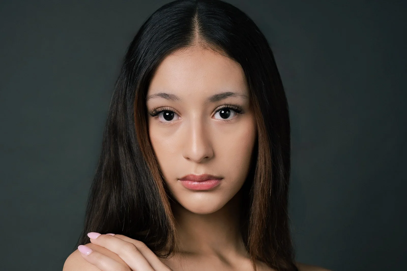 Close up of a young girl with dark brown hair