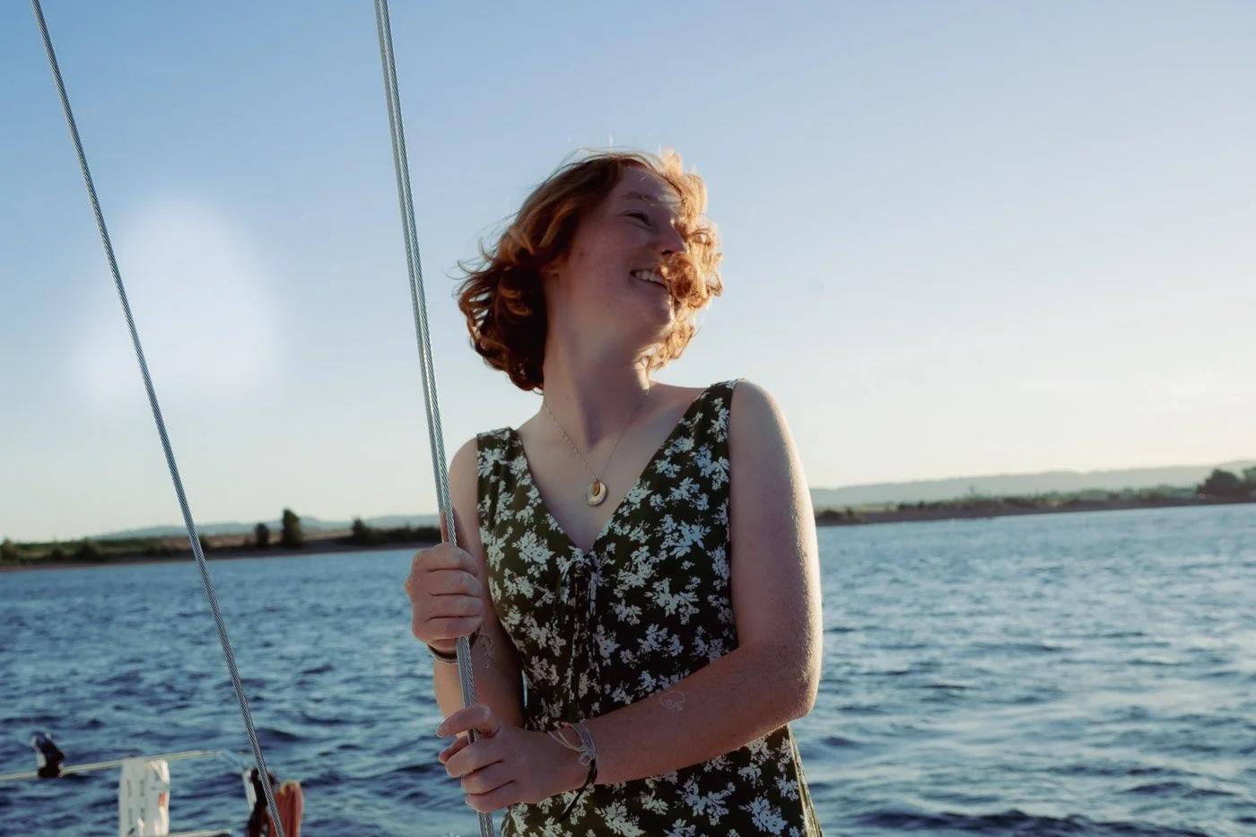 Senior photoshoot on a sail boat in Portland