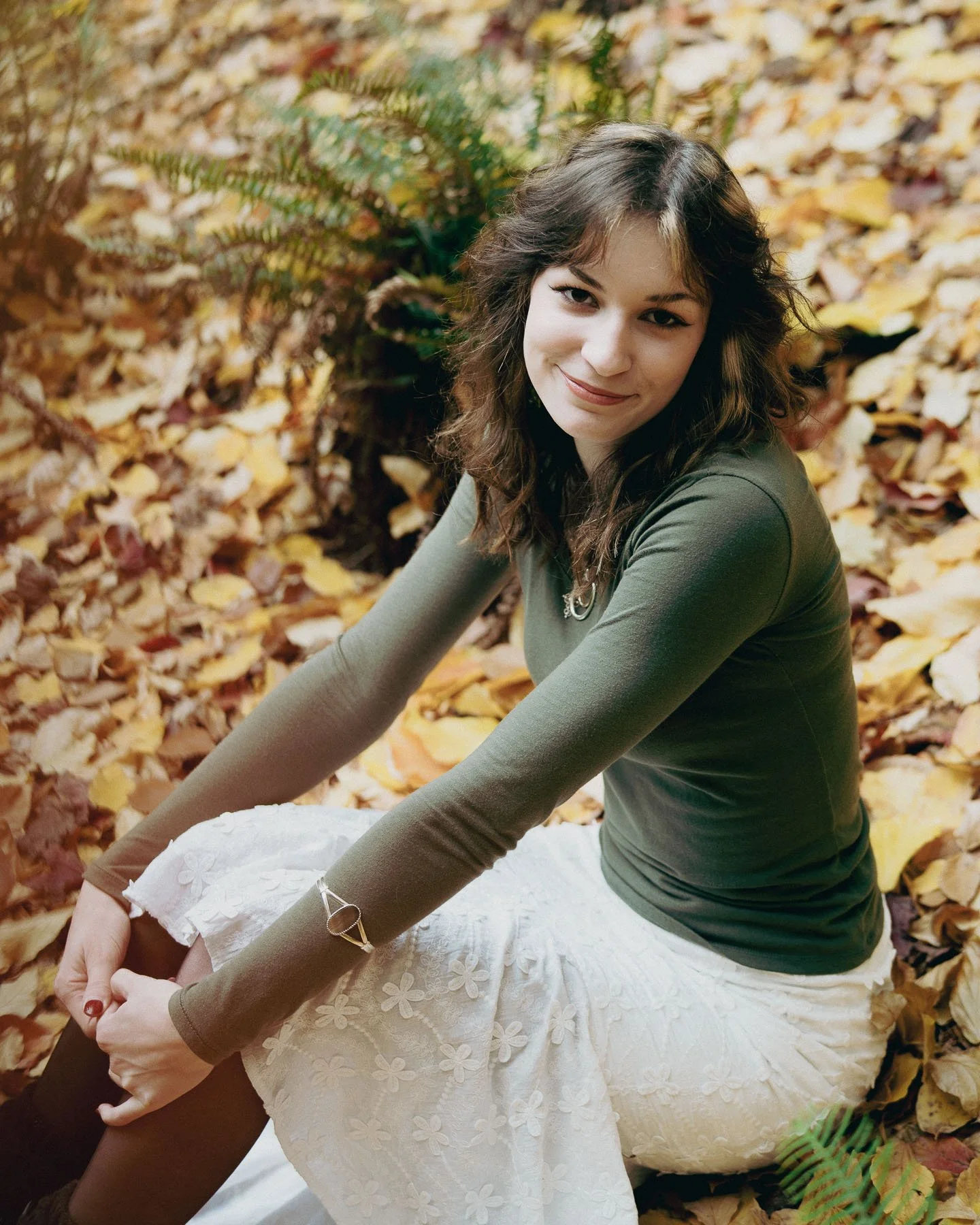 Senior portrait in fall colors at Laurelhurst Park