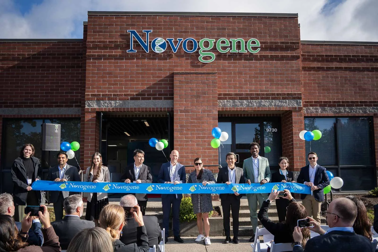 Ribbon cutting ceremony in front of the Novogene Lab building in Beaverton