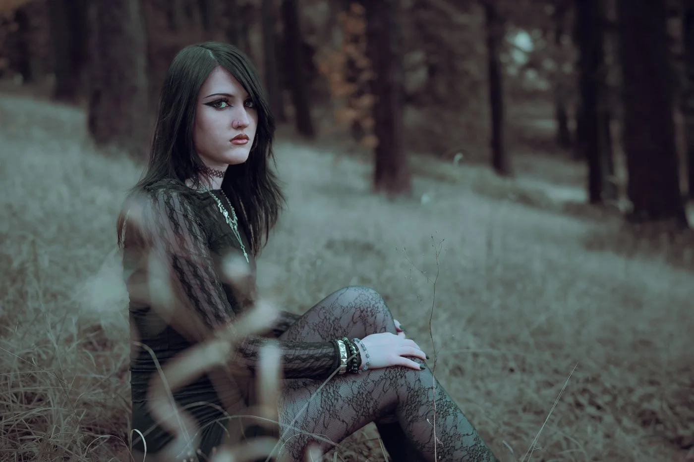 Emo girl in all black sitting in the forest at Mt Tabor