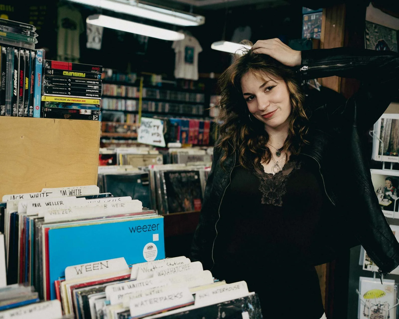 Senior Photos of a girl in a record shop