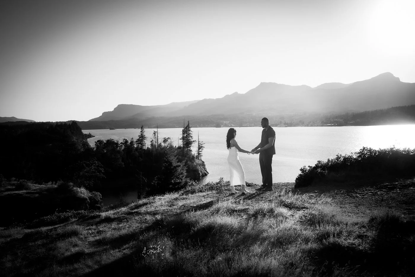 A man proposing to his girlfriend on cliffs above the Columbia river