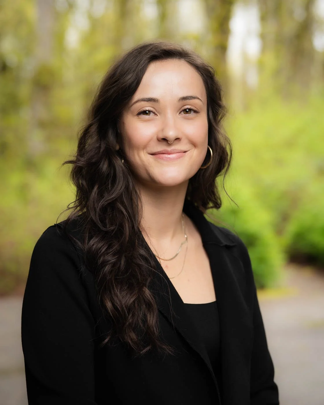 Outdoor headshot in vivd green natural space