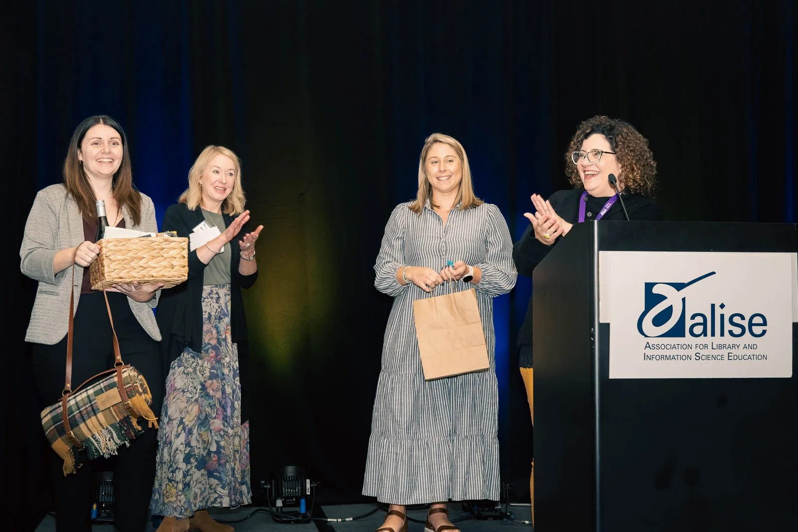 Awards being handed out on stage at the Alise annual conference