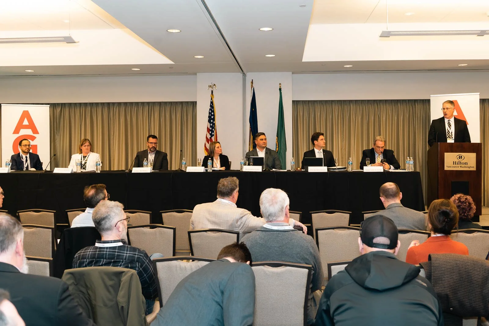 The board of directors in front of a crowd for the AGC annual conference