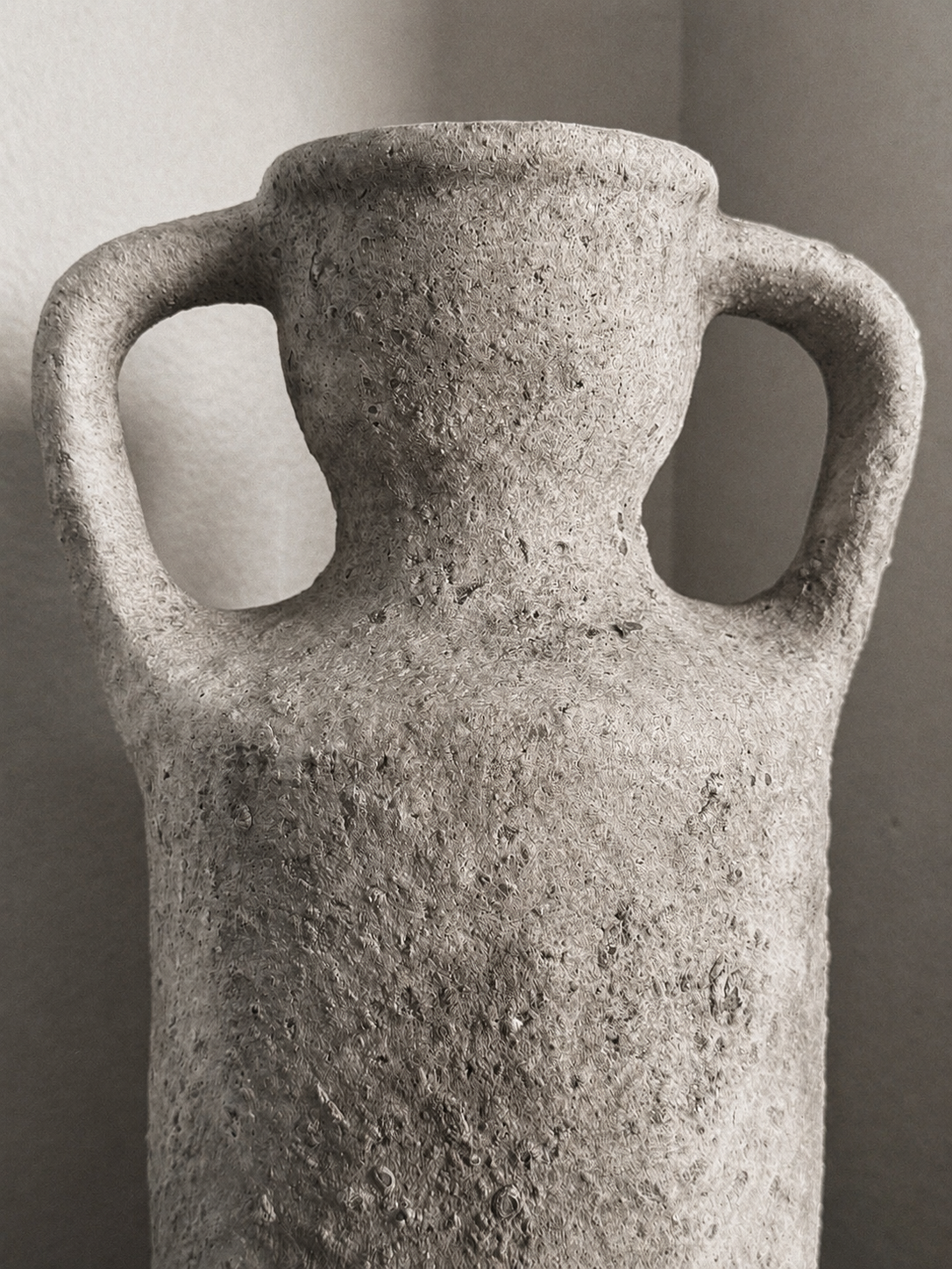 handmade jar in white stucco