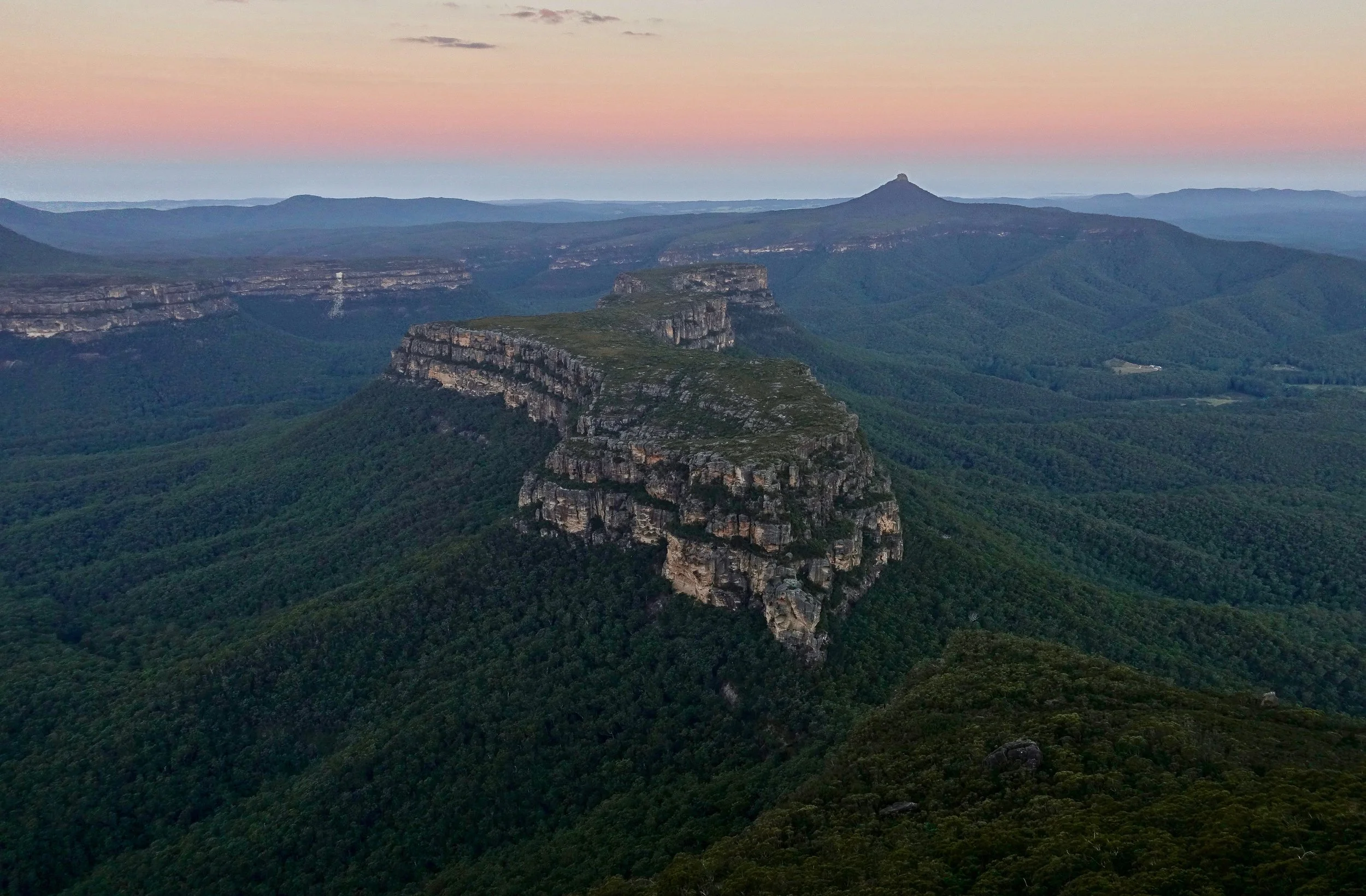 Pigeon House and Byangee Mountain from the Castle at sunset in the Budawangs in Australia