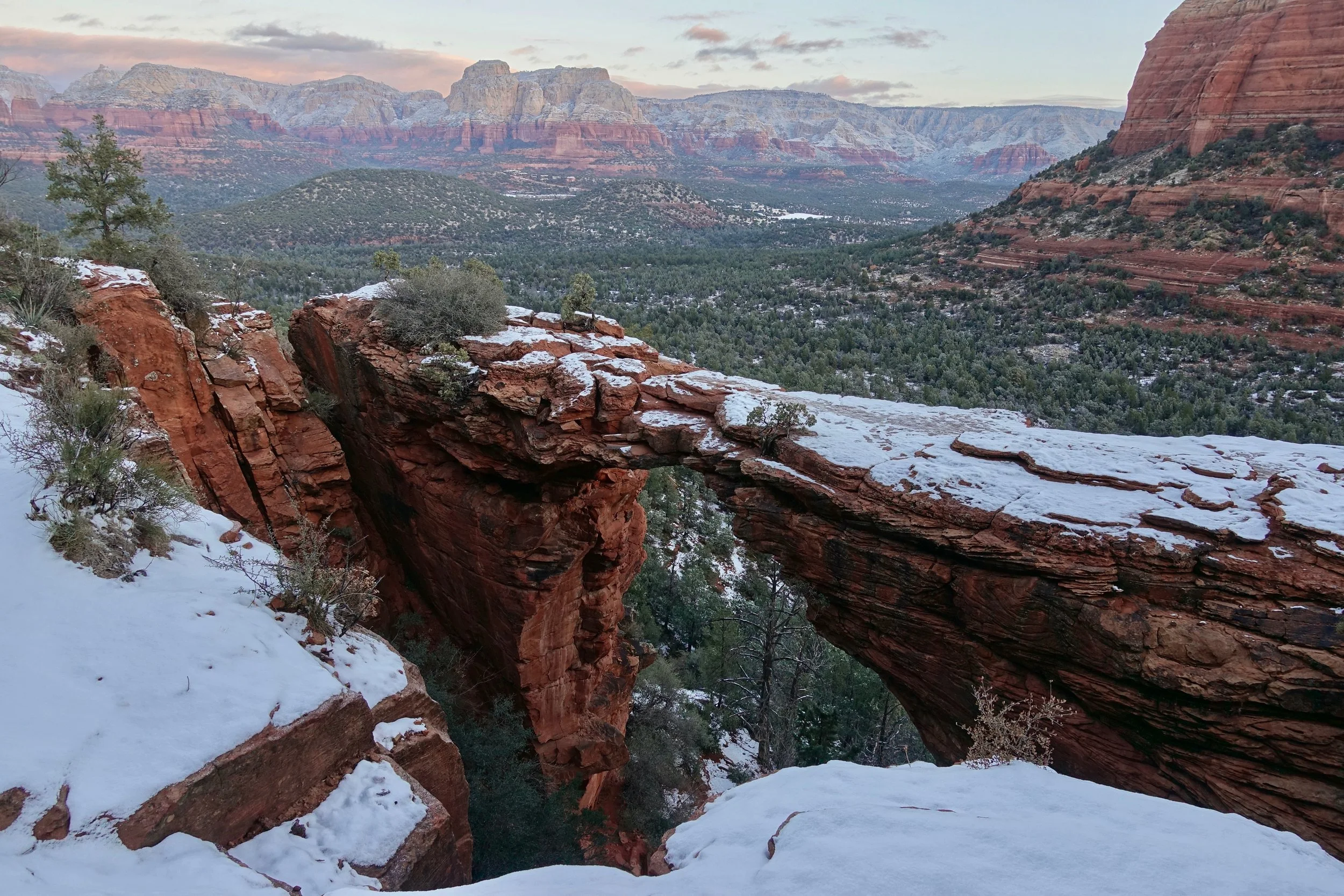 Devil's bridge hike at sunrise after the snow in winter in Sedona Arizona