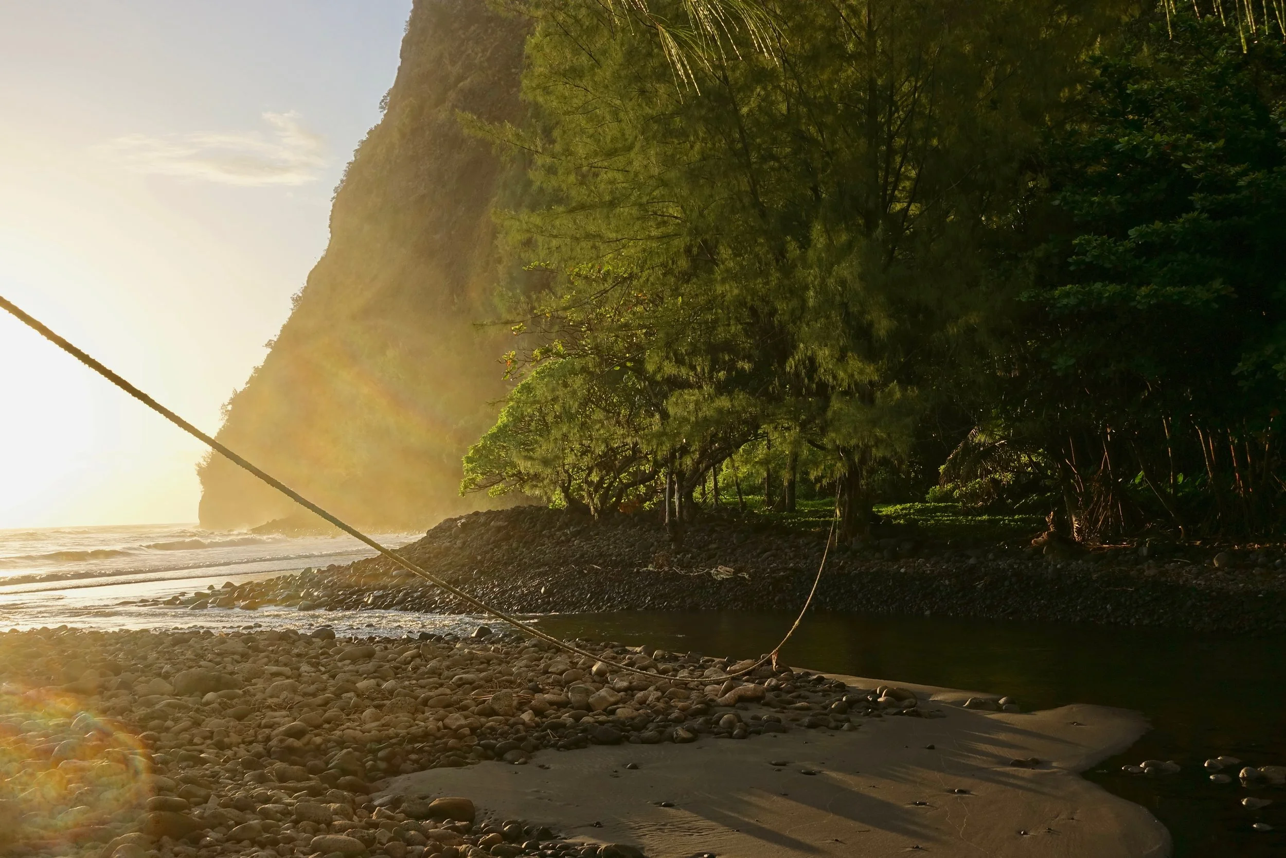 Waimanu valley creek crossing in Hawaii on the Muliwai Trail